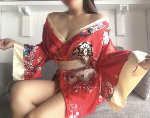 Japanese woman in a red kimono available for sensual massage bookings